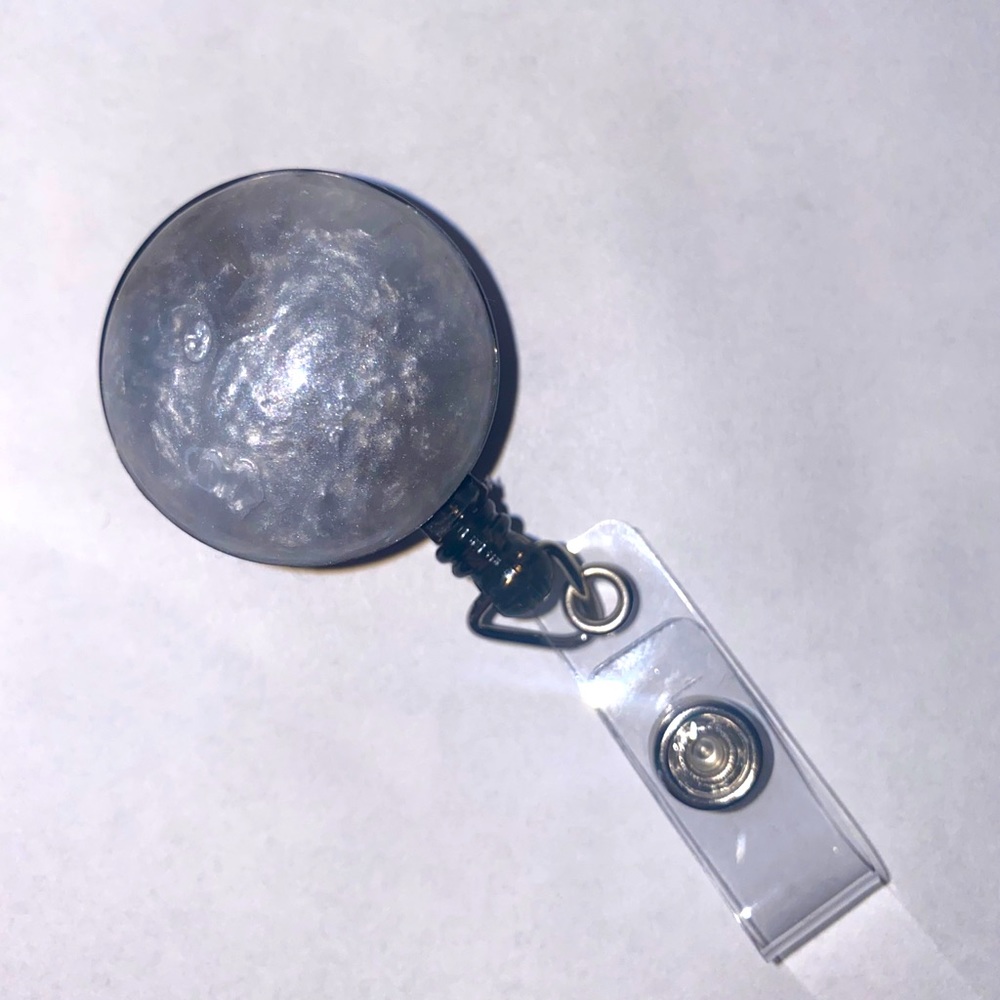 Silver foggy marble #1 resin badge reel 3 for $15